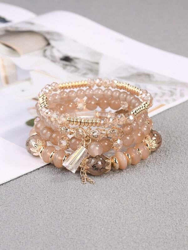Set de 4 pulseras de moda estilo bohemio con cuentas y acentos de cristal de vidrio, perfectas para combinar capas y regalar