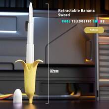1pc Retractable Banana Sword - Gravity Sensing Design, Portable Mini Version, Elastic Samurai Sword Shape, Finger Pressure Relief Tool, Party Gag Gift, Birthday Fun Surprise, Holiday Humor Gift, Christmas Funny Favor, New Year Entertainment Item, Adult Novelty Toy, Desktop Dynamic Decoration