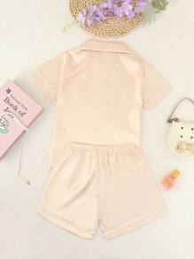 Conjunto de pijama de 2 piezas para niñas con polo, mangas cortas y pantalones cortos. unicolor y eslogan "Buenas noches", cómodo y casual para estar en casa