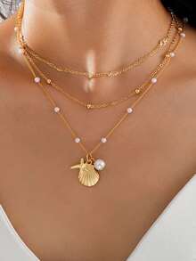 Bộ 3/5 chiếc vòng cổ hình vỏ sò, sao biển, hoa và ngọc trai giả thanh lịch dành cho nữ, đa năng cho bãi biển, hẹn hò, tiệc tùng, quà tặng, đeo hàng ngày - Vàng - Xem 15