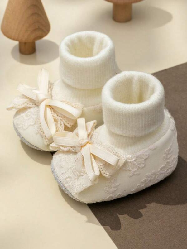 Frühlings-Neugeborene Baby Mädchen 0-1 Jahre alte weiche Sohle rutschfeste Schuhe Socken Set mit Schleife Fußabdeckung