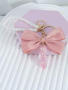 三件套：闪亮粉色洋葱亮片、26个树脂大写英文字母、18K镀金龙虾扣扁环链，搭配时尚粉色布艺蝴蝶结和仿珍珠串珠装饰配件，适用于包包链、手机挂绳、钥匙扣，也可作为礼物送给朋友、母亲、车饰、包包挂饰、背包挂件、带证件夹的挂绳、汽车装饰、圣诞汽车饰品、老师、姐妹等。 - 粉色 - 查看 29