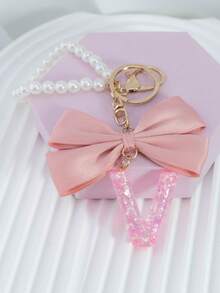 三件套：闪亮粉色洋葱亮片、26个树脂大写英文字母、18K镀金龙虾扣扁环链，搭配时尚粉色布艺蝴蝶结和仿珍珠串珠装饰配件，适用于包包链、手机挂绳、钥匙扣，也可作为礼物送给朋友、母亲、车饰、包包挂饰、背包挂件、带证件夹的挂绳、汽车装饰、圣诞汽车饰品、老师、姐妹等。 - 粉色 - 查看 12