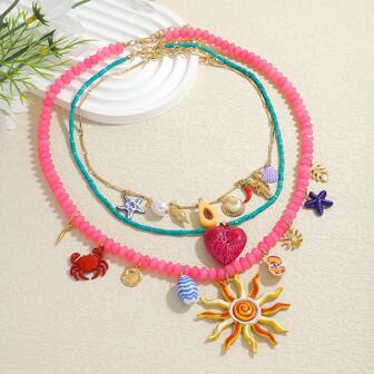 3 stuks Bohemian stijl multi-element hartvormige dames hanger kettingen, zomerse oceaan elegante stijl zonnebloem hart schelp zeester krab kreeft schelp bladeren avocado chili parel blauw en wit porselein legering schattige accessoires dames kralen kettingen, geschikt om te dragen op zomerse strandfeestjes bijeenkomsten (hanger accessoires zijn willekeurig, kleur kan lichte fouten bevatten)