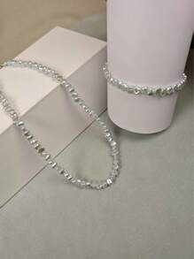 Set di gioielli composto da collana e braccialetto con perle finte irregolari, un regalo