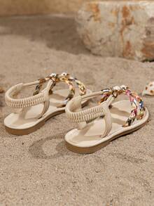 1 par de sandalias planas de moda para niños, sandalias de estilo bohemio, sandalias de tejido a mano coloridas con decoración de diamantes brillantes, adecuadas para la escuela, vacaciones y uso en la playa - Beis - Ver 5