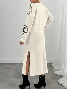 مجموعة قطعتين لفصل الخريف/الشتاء: كارديجان محبوك بنقشة زهور سوداء وبيضاء مع تنورة قلم أنيقة