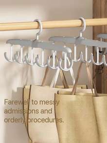 1件/3件/12钩塑料衣架套装：节省空间的衣橱收纳架，可用于收纳文胸、背心等衣物。多功能12钩设计，最大限度利用衣柜空间。轻便耐用的塑料材质，使衣物整齐展示，减少褶皱。非常适合宿舍、公寓、小型衣橱、旅行和日常使用。高效收纳内衣和配饰，防止衣架滑落。安装简便，可折叠，方便旅行携带。半透明表面，可堆叠收纳，打造整洁衣橱。 - 彩色 - 查看 2