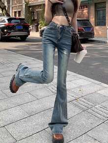 女式休闲日常水洗斜口袋喇叭牛仔裤