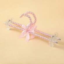 1/2/5 Piezas de colgador de perlas falsas con un lazo, pinza de pantalones de perlas falsas y colgador para mascotas. El soporte para colgar ropa es adecuado para colgar prendas de estilo hada como vestidos, pantalones, zapatos, jeans, botas y faldas.