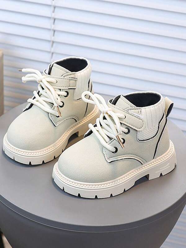 Nouvelles chaussures pour filles Bottes pour enfants Petites bottes jaunes Bottes pour garçons Bottes cheville Semelle souple Anti-dérapante Mode automne Petites bottes