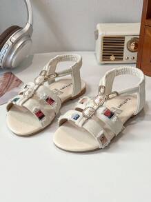 1双。适合3-12岁女孩。饰有牛仔织带。面料和合成皮革。防滑耐磨。露趾低帮。带扣平底鞋带。甜美公主风格。凉鞋。适合夏季外出和派对穿着。 - 米色 - 查看 5