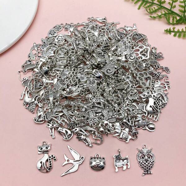 20/50/100 piezas Colección de dijes vintage de plata con diseños de animales (gatos, perros y búhos) - Componentes llamativos para manualidades de joyería