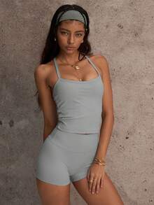 PinkTip Bộ đồ thể thao gồm áo crop top cổ chữ V chéo và quần short cạp cao, chi tiết cắt laser ở lưng và hệ thống định hình vòng bụng, co giãn bốn chiều, chống tia UVC, thích hợp cho phòng tập, yoga và các hoạt động thể thao ngoài trời mùa hè. - Xám - Xem 6