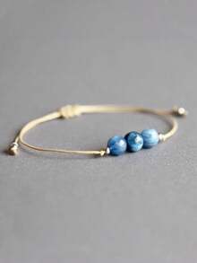 1 szt. Niebieska bransoletka z kyanitu Bransoletka damska Bransoletka z kyanitu Bransoletka z kryształu leczniczego Bransoletka z koralików Bransoletka łagodząca stres Biżuteria z kyanitu - Niebieski - Zobacz 2