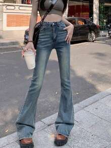 女式休闲日常水洗斜口袋喇叭牛仔裤