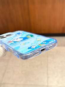 Doraemon Funda de teléfono con licencia oficial, compatible con Apple iPhone 16 Pro Max, funda protectora para iPhone 15 Pro Max, funda transparente con diseño de Doraemon, anti-caída y antideslizante, impresión de alta definición a color, efecto brillante para iPhone 11, 12, 13, 14, 15, 14 Plus, 15 Plus, 16 Plus