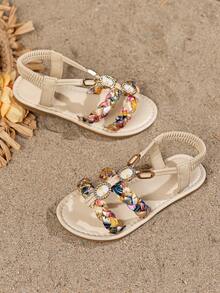 1 par de sandalias planas de moda para niños, sandalias de estilo bohemio, sandalias de tejido a mano coloridas con decoración de diamantes brillantes, adecuadas para la escuela, vacaciones y uso en la playa - Beis - Ver 3