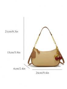 新款时尚女士新月形包，采用纯色防水PU材质，饰以字母图案和樱桃吊坠，配有链条手柄和可调节肩带，轻便休闲，适合日常使用、购物、通勤和与朋友外出。