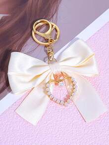 1pc Bowknot Bag Charm, A Bag Accessory, And An Faux Pearl Keychain. It's A Perfect Mother's Day Gift. This Cute Faux Pearl Beaded Bracelet-Style Keychain Exudes A Vintage Charm. It Is Suitable For Decorating Ladies' And Girls' Handbags, Backpacks, And Even Cars. The Pearl Pendant Adorned With A Ribbon Is Also An Excellent Choice For Valentine's Day And Birthday Gifts. - Multicolor - View 13