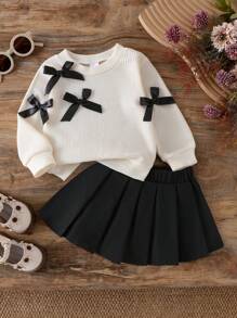 2pcs/Set Baby Girl Black Bow Decor Round Neck Long Sleeve Top Casual Shirt And Pleated Skirt Suit