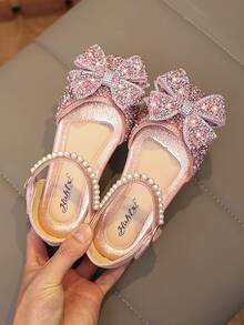 1 Đôi dép xăng đan đế bằng màu hồng thời trang mới, đa năng, đính ngọc trai và nơ đá lấp lánh cho bé gái, mũi tròn, thích hợp cho mang hàng ngày, khiêu vũ, hoạt động ngoài trời mùa xuân và mùa thu, giày công chúa mũi kín đính kim tuyến, size nhỏ hơn 1 size. - Hồng - Xem 8