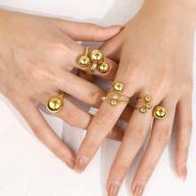 1 pièce Bague en acier inoxydable de mode avec perles sphériques dorées, bague en titane géométrique personnalisée exagérée, accessoires de bijoux dorés pour le carnaval, à porter au quotidien