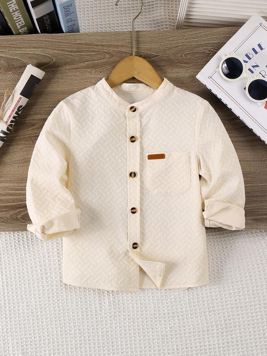 Koszula chłopięca z długim rękawem w jednolitym kolorze, żakardowa tkanina, kołnierzyk typu stójka, guziki, kieszeń na piersi, odpowiednia do codziennego noszenia na co dzień oraz na imprezy wiosną i jesienią - Beżowy - Zobacz 1