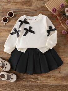 2pcs/Set Baby Girl Black Bow Decor Round Neck Long Sleeve Top Casual Shirt And Pleated Skirt Suit