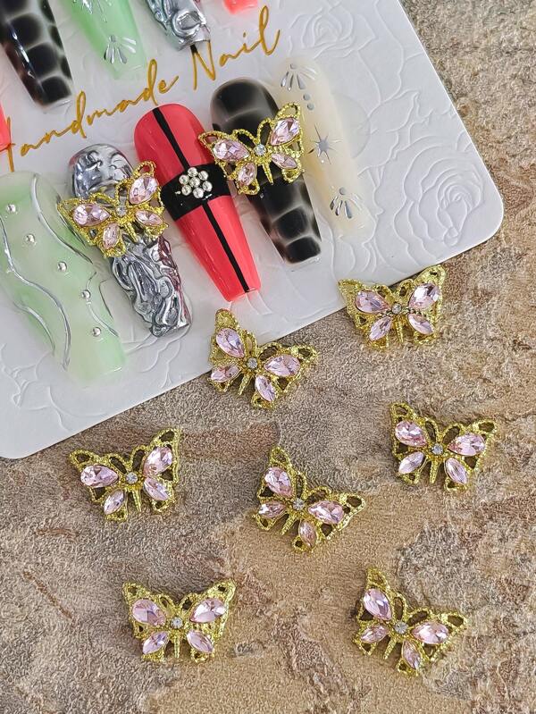 10 pièces Base dorée creuse, décorations d'ongles en alliage rose avec papillon, strass Aurora, accessoires DIY, ornements pour ongles, fournitures pour l'art des ongles