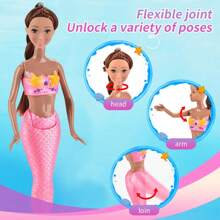 这款美人鱼娃娃拥有色彩缤纷的梦幻发型和头饰，配有海星形紧身胸衣和柔软的粉色美人鱼尾巴，适合作为3-8岁女孩的生日礼物。