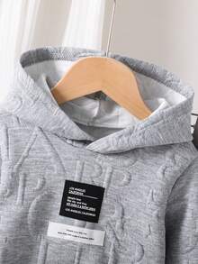 Conjunto de sudadera con capucha gris con estampado en relieve para niña joven, diseño de sudadera con capucha elegante y práctico, aplicación con letras en el pecho agrega moda, adecuado para la escuela, deportes, uso casual, otoño/invierno