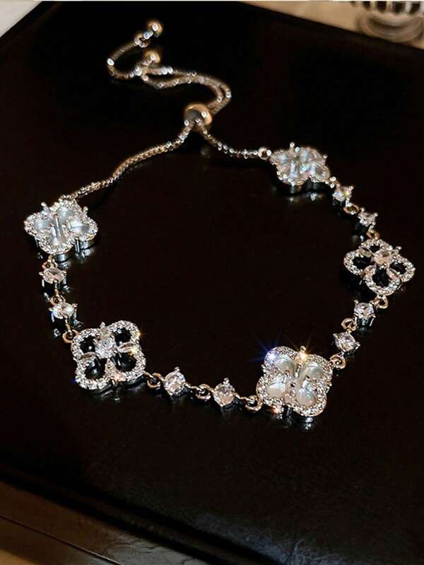 1 pièce Bracelet fleur à 4 pétales en zircone pour femmes, réglable, accessoire de style élégant et de luxe léger