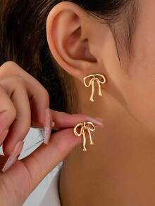 1pair Europe And America  Simple & Versatile & Elegant & Geometric & Asymmetrical Bowknot Design Earrings For Women - Geometric Irregular Bow Women's Stud Earrings - View 16