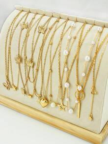 11 piezas Elegante Set de collares vintage de perlas falsas, corazones, rhinestones, mariposas geométricas con rayas verticales y cadena de serpiente de metal multicapa, adecuado para vacaciones, fiestas, citas, regalos y uso diario (sin caja) - Dorado - Ver 2