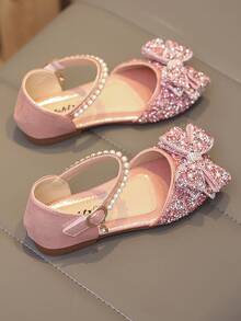 1 Đôi dép xăng đan đế bằng màu hồng thời trang mới, đa năng, đính ngọc trai và nơ đá lấp lánh cho bé gái, mũi tròn, thích hợp cho mang hàng ngày, khiêu vũ, hoạt động ngoài trời mùa xuân và mùa thu, giày công chúa mũi kín đính kim tuyến, size nhỏ hơn 1 size. - Hồng - Xem 7