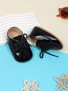 A Pair Of Solid-Color Lace-Up Flat Non-Slip Casual Sports Shoes For Boys Aged 0-1 Years, Suitable For Spring And Autumn. - Black - View 2