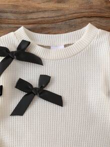 2pcs/Set Baby Girl Black Bow Decor Round Neck Long Sleeve Top Casual Shirt And Pleated Skirt Suit