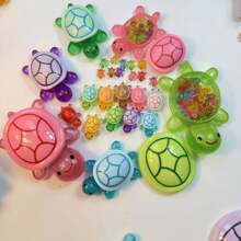 1 صندوق تخزين سلحفاة كبير يضيء في الظلام + 15 سلحفاة صغيرة تضيء في الظلام، 6 قطع و10 قطع سلاحف صغيرة تضيء في الظلام، سلاحف كبيرة تضيء في الظلام، ديكور حوض السمك من الراتنج، تمثال سلحفاة مضيء - ديكور حديقة من الراتنج على شكل حيوان صغير - لا يحتاج إلى كهرباء أو بطارية، ديكور خارجي، نموذج بلاستيكي مضيء يدوي الصنع، مناسب لل- DIY وفن الأظافر وديكور المنزل | تمثال حيوان مثير للاهتمام | ديكور السلاحف