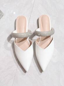 新款时尚女式尖头白色水钻平底鞋、休闲一脚蹬穆勒鞋