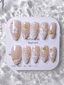 10片手工美甲贴纸，适用于短指甲，假指甲，杏仁形指甲，裸色指甲，柔和清新风格，海洋假日风，春夏美甲，手绘3D贝壳纹理，五瓣花，荷叶边裙摆和海星，贝壳图案，金色钢珠，珍珠水钻装饰，包含美甲工具，适合各种场合，易于粘贴和卸除，适合女性和女孩的杏仁形美甲贴纸 - 白色 - 查看 10