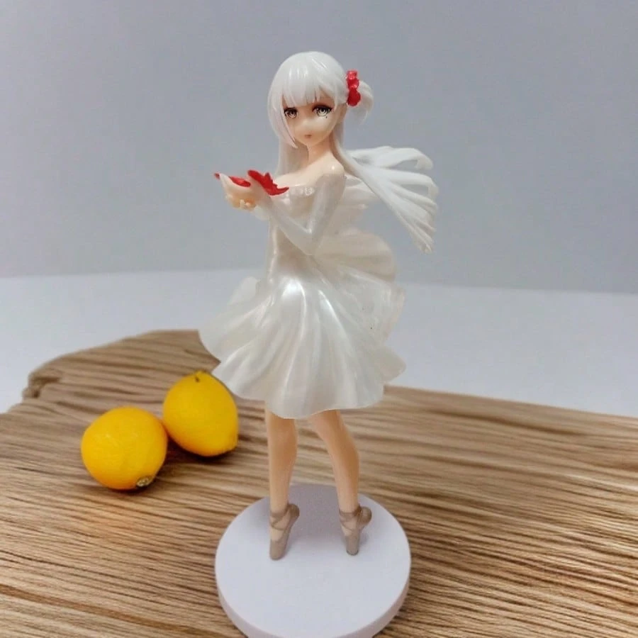 24 cm tall resin ballerina figure wearing a white dress and holding a red ribbon, posed gracefully