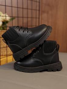 1 par de botas elásticas para niños, tela de PU de unicolor suave y cómoda, diseño de cuello elástico ajustado, cordones delanteros y punta redonda, suela gruesa y cálida que aumenta la altura, estilo británico de moda, botas de tobillo adecuadas para niños y niñas para uso diario casual en interiores y exteriores en otoño/invierno, nuevo - Negro - Ver 2