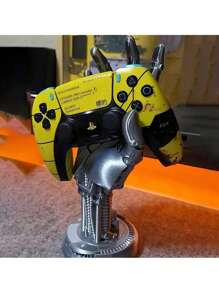 1 件设计独特的雕塑，描绘了科幻赛博朋克机械臂，设计先进独特。它可以用作游戏控制器支架或耳机支架，是理想的桌面装饰。这款礼物非常适合游戏爱好者和男士，也适合父亲节、圣诞节、周年纪念日和感恩节等场合。