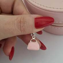 Berloque Bolsa com Corações Rosa Banhado a Prata