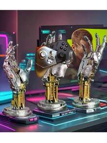 1 件设计独特的雕塑，描绘了科幻赛博朋克机械臂，设计先进独特。它可以用作游戏控制器支架或耳机支架，是理想的桌面装饰。这款礼物非常适合游戏爱好者和男士，也适合父亲节、圣诞节、周年纪念日和感恩节等场合。