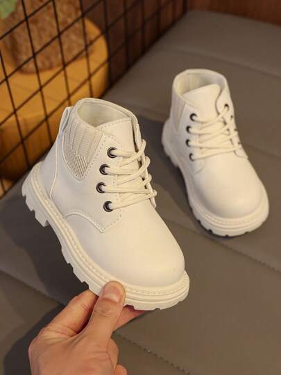 1 par de botas elásticas para niños/niñas pequeños, de PU de unicolor suave y cómodo, con cuello elástico, cordones delanteros, punta redonda, suela gruesa y cálida, elevada, estilo británico de botas cortas, adecuadas para niños y niñas, para interior/exterior, nuevas para otoño/invierno