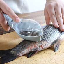 一把手动去鳞器，适用于各种鱼鳞，操作简单，能轻松去除鱼身上的鳞片，是厨房必备的小工具。 - 彩色 - 查看 5