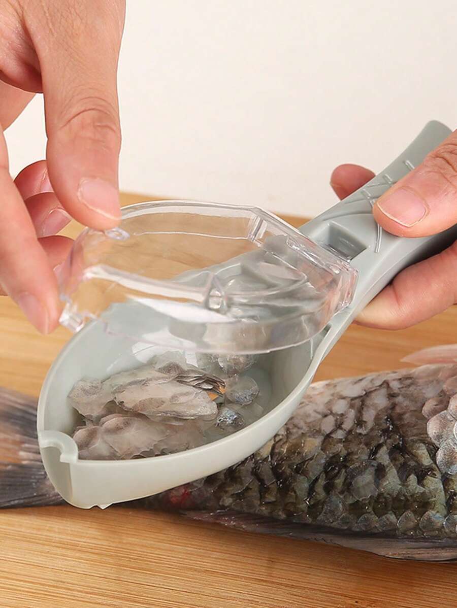 一把手动去鳞器，适用于各种鱼鳞，操作简单，能轻松去除鱼身上的鳞片，是厨房必备的小工具。 - 彩色 - 查看 1