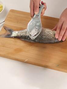 一把手动去鳞器，适用于各种鱼鳞，操作简单，能轻松去除鱼身上的鳞片，是厨房必备的小工具。 - 彩色 - 查看 2